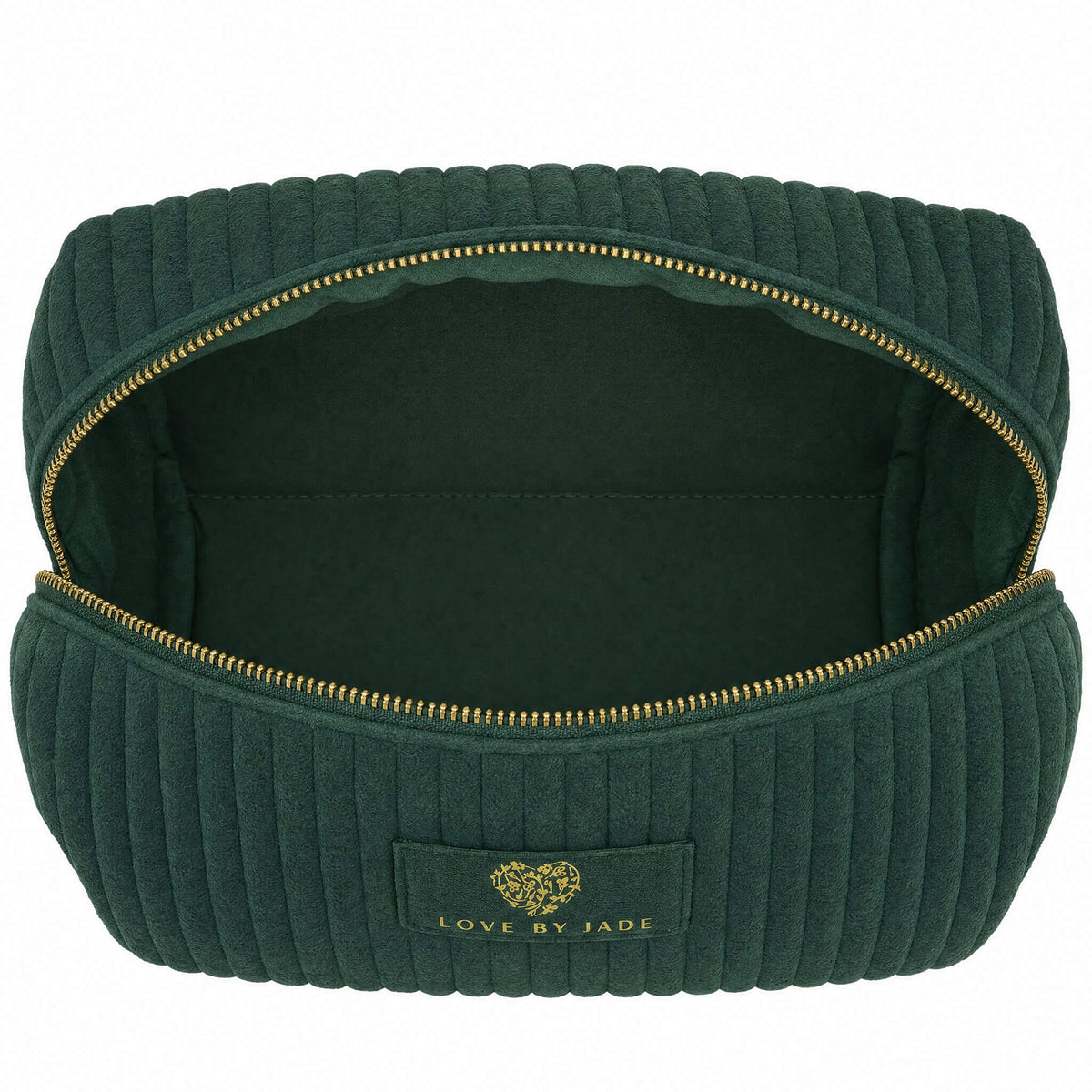 The Velvet Beauty Bag unzipped and open, showing the interior compartment.